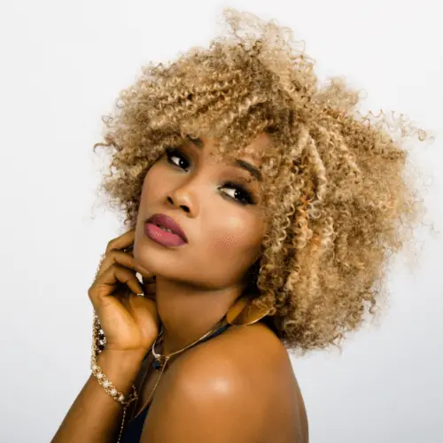 Woman with curly blonde hair